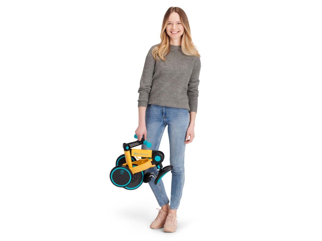 Detail skladania a prenosnej rukoväte žltej trojkolky Kinderkraft 4TRIKE